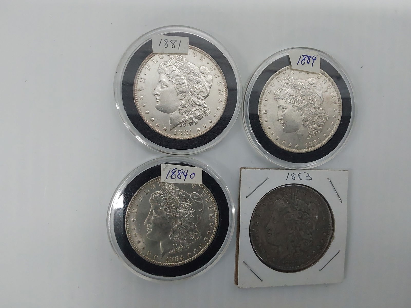(4) Morgan silver dollars (1 of 2)