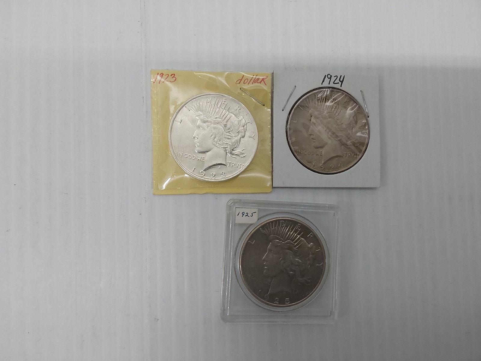 (3) Peace silver dollars (1 of 2)