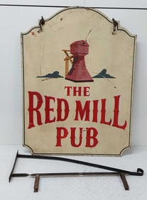 The Red Mill Pub wood sign with hanger