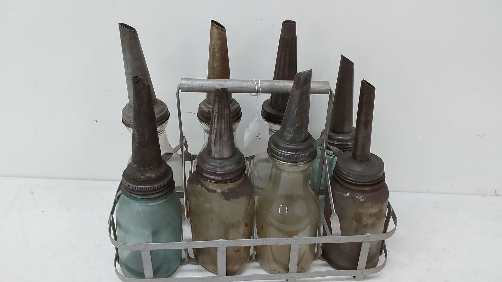 (8) oil bottles with can (1 of 2)