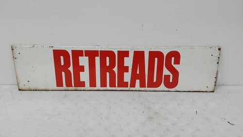 Retreads DST tire rack sign