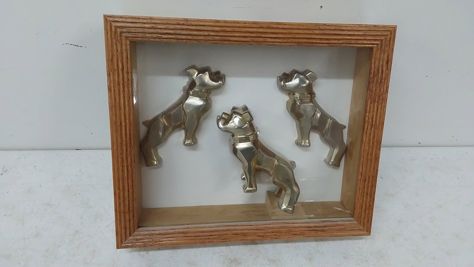 framed Mac truck bull dogs plaque: 9 1/4" x 11 1/4" x 3"