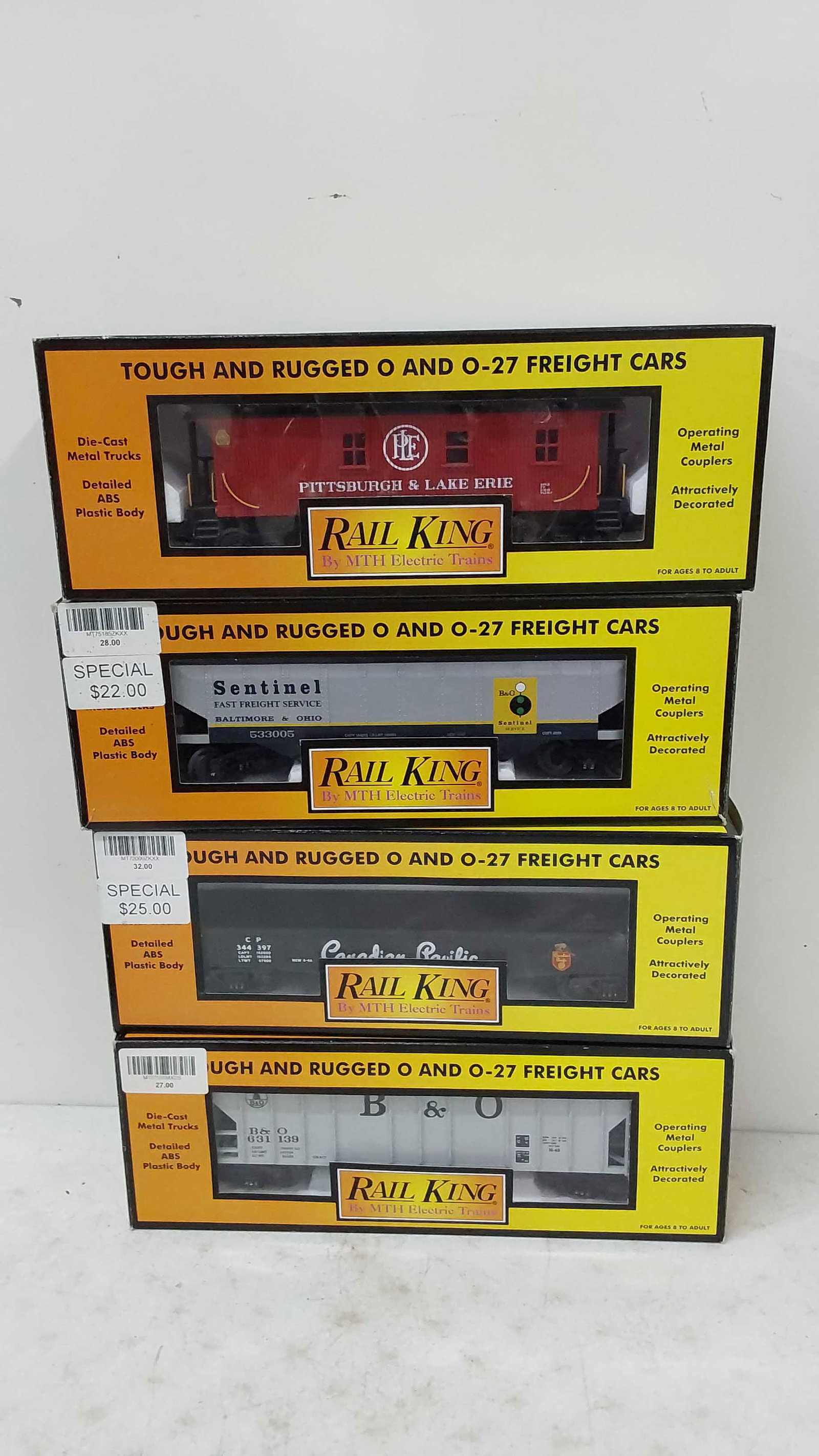 (4) Rail King train cars in boxes: 30-7555 30-74442 (no crates) 30-75185 30-77091