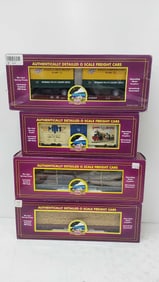 (4) MTH train cars with boxes