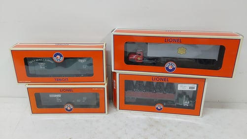 (3) Lionel train cars and (1) tractor trailer