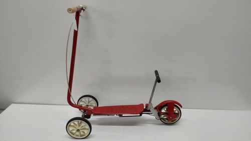 vintage Kick N Go 3-wheel scooter