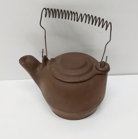 child's cast iron tea pot
