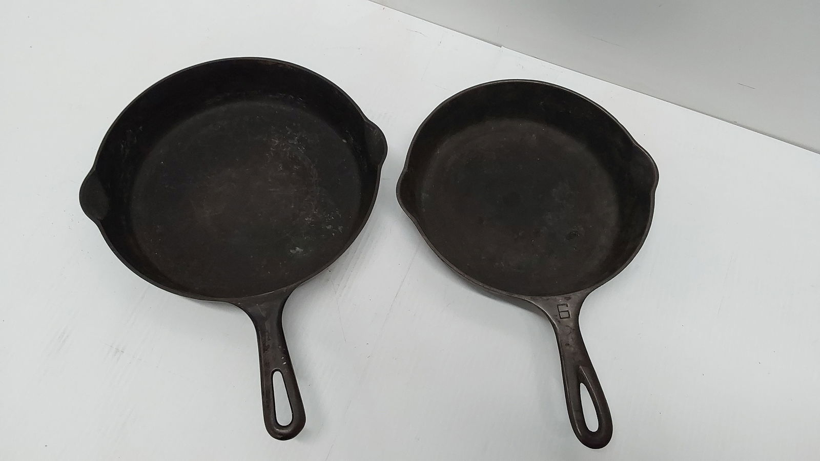 (2) Griswold cast iron skillets w/small logo (1 of 3)