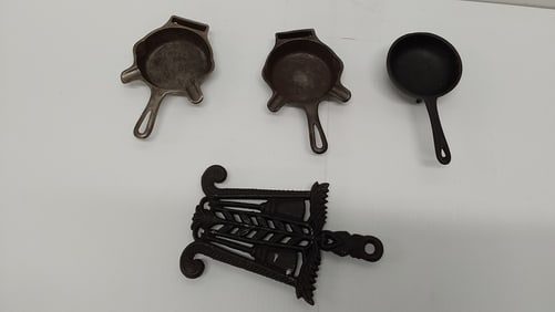 flat of (4) Griswold pieces