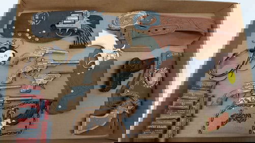 (10) various cap guns and accessories