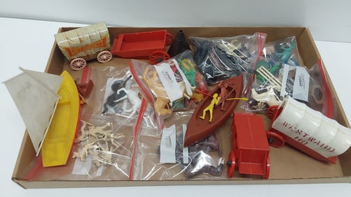 flat of plastic toys
