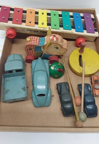 flat of vintage toys