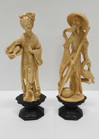 pair of oriental bone/resin figures
