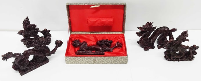 (5) red resin dragon statuettes and (1) box