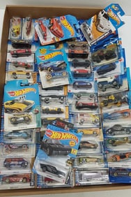 (55) Hot Wheel cars and trucks