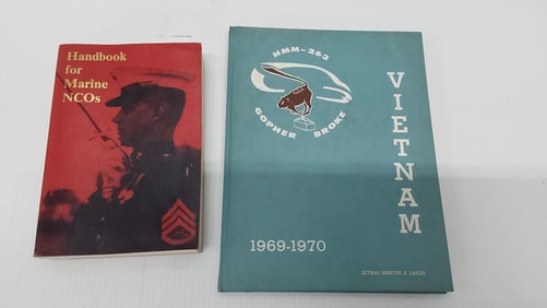 Marine NCO signed handbook and Vietnam yearbook