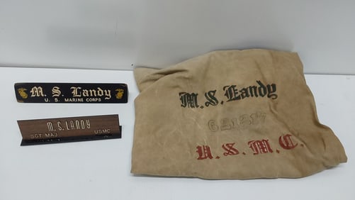 Identified USMC desk name plates and duffle bag
