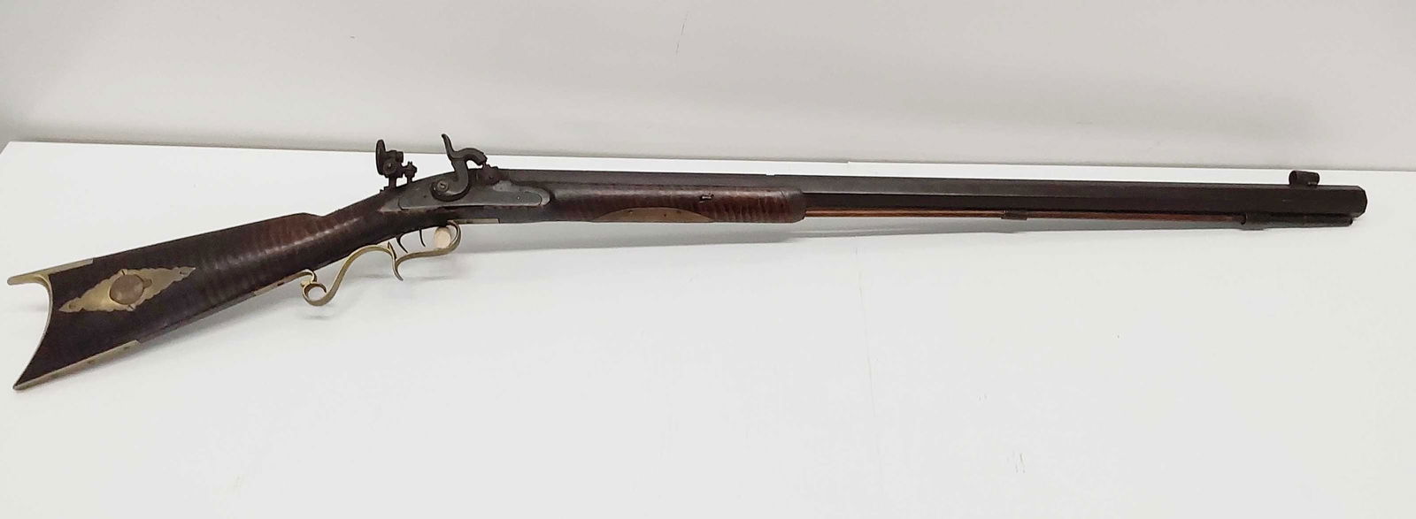 early percussion rifle with heavy octagon barrel: Custom for long range shooting. C.P. GREGORY 45cal??? peep sights SN: N/A