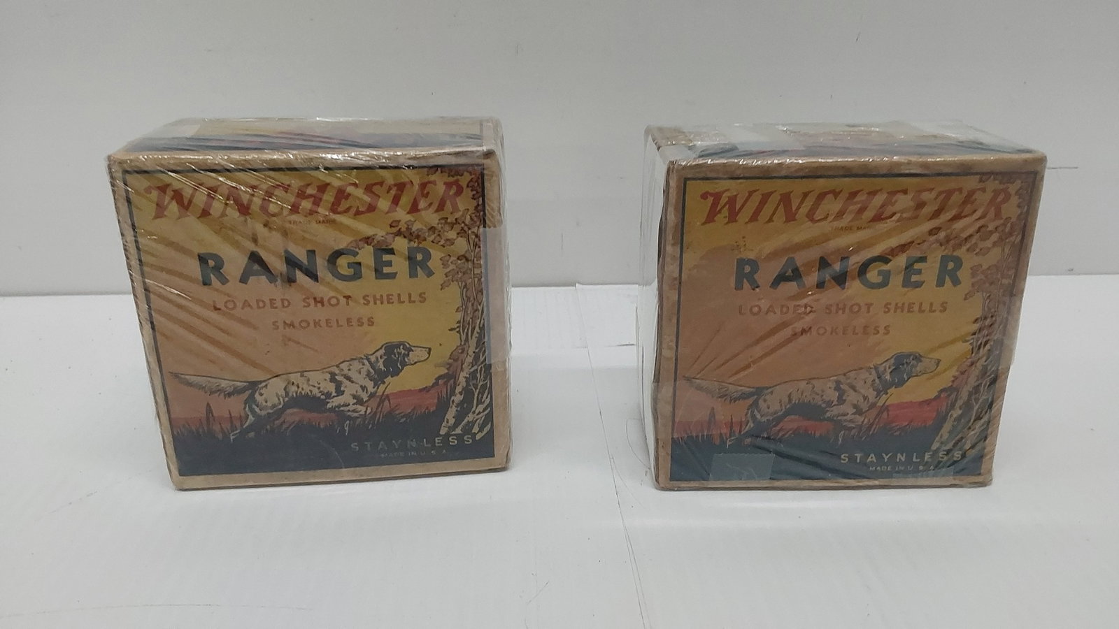 (2) vintage Winchester 12ga ammunition boxes: One box is full, the other box has empty hulls