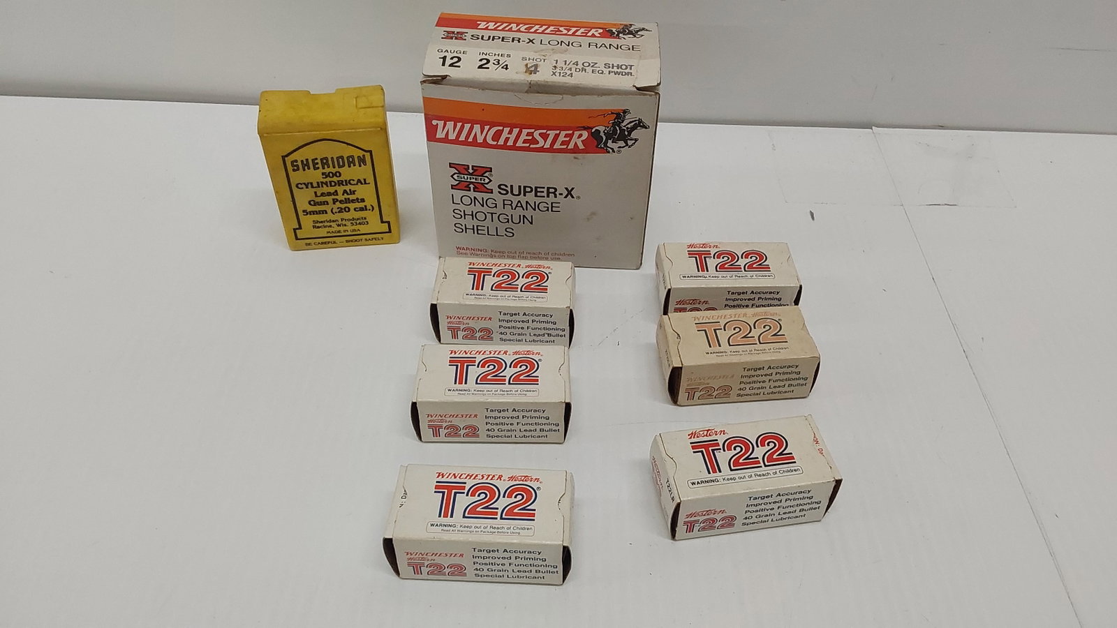 miscellaneous ammunition lot: (6) boxes of Winchester .22LR (1) box of 5mm pellets (1) partial box of 12ga 4-shot