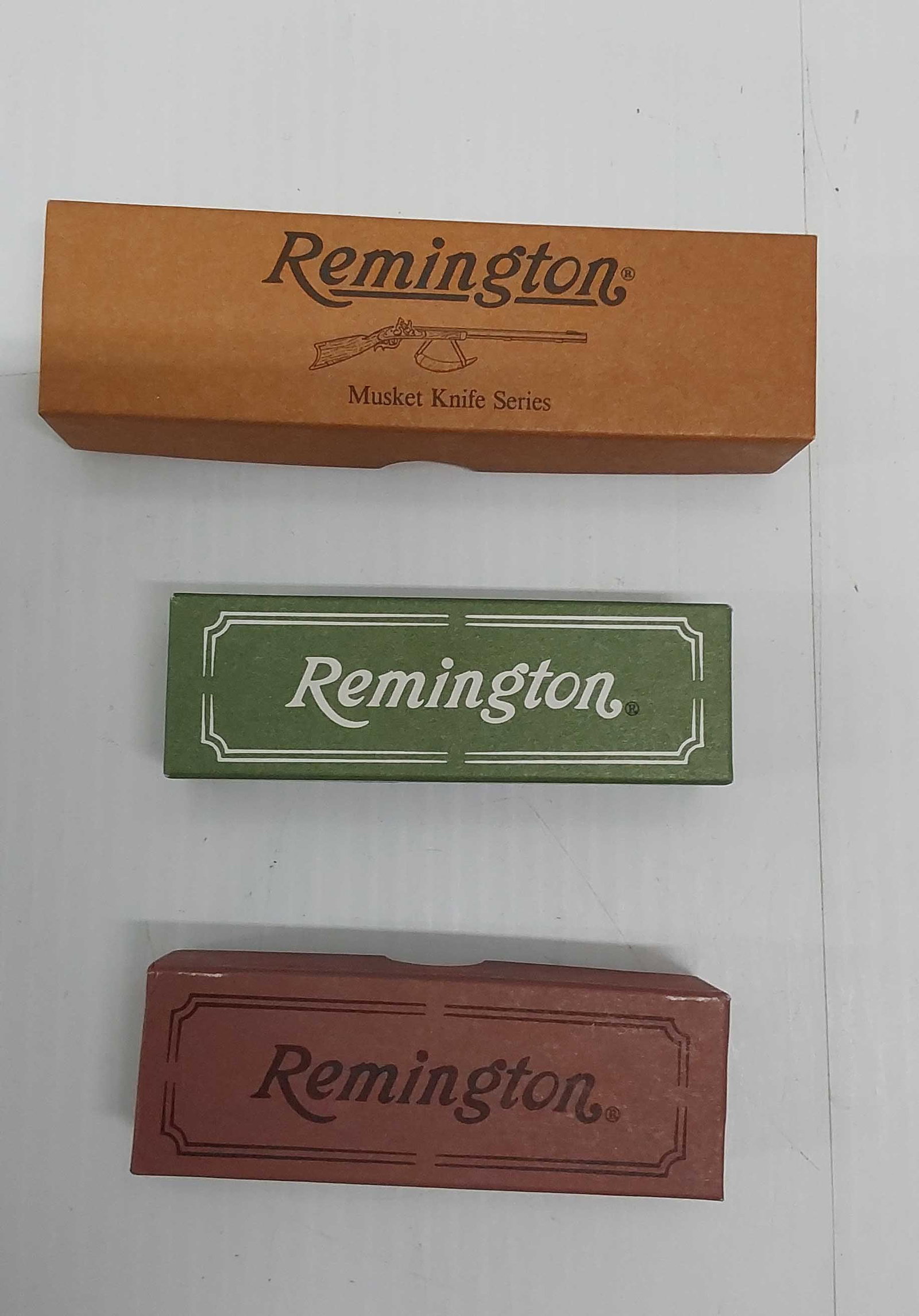 (3) Remington pocket knives in boxes: (1) Musket knife series - bone