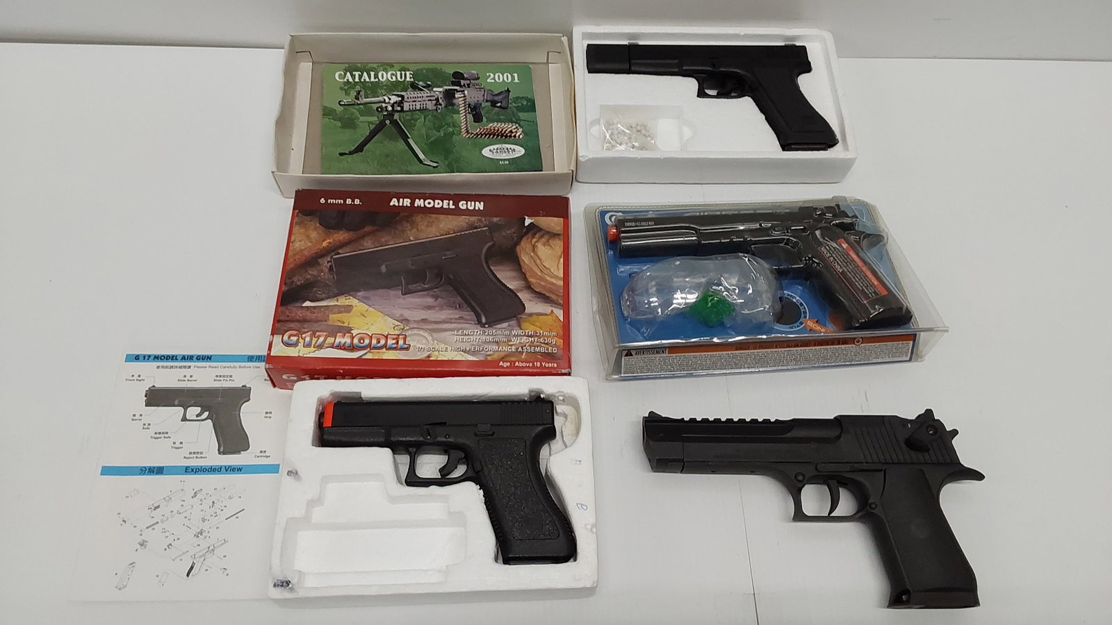 (4) Airsoft pistols: KWC Glock 17, HFC Glock 17, Desert Eagle, Colt 1911 Target
