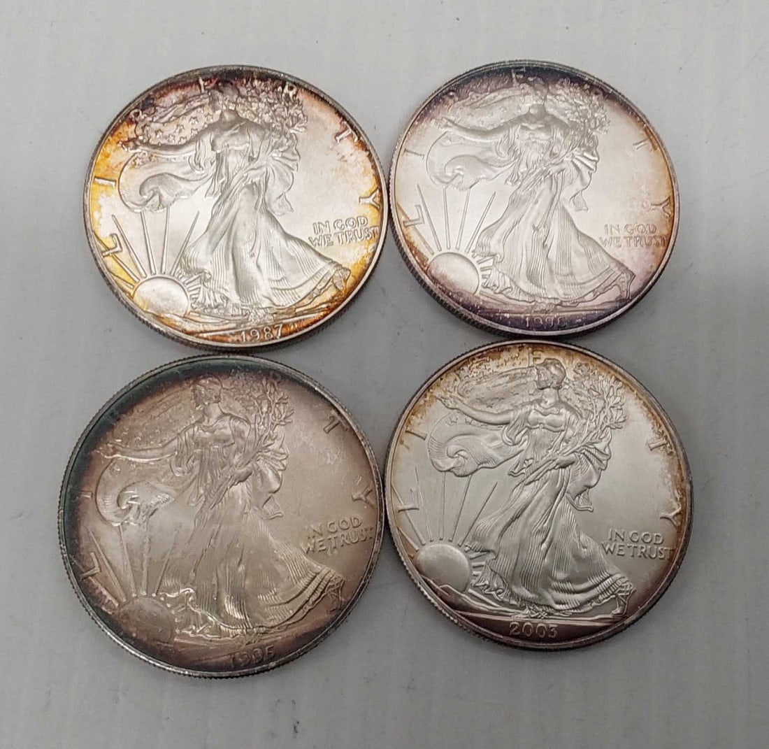 (4) silver Eagles: 1987, 1995, 1996 and 2003
