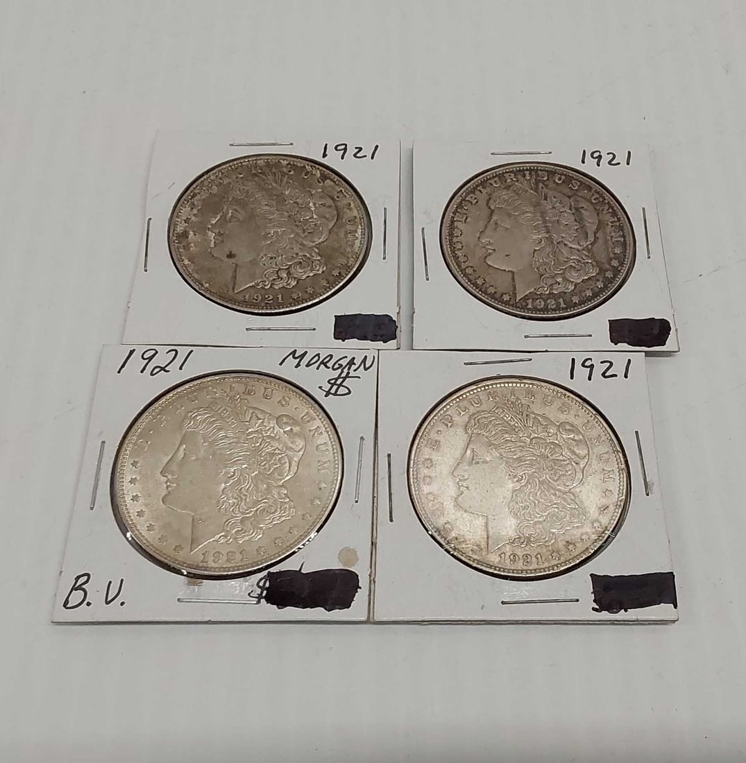 (4) 1921 Morgan silver dollars: 90%