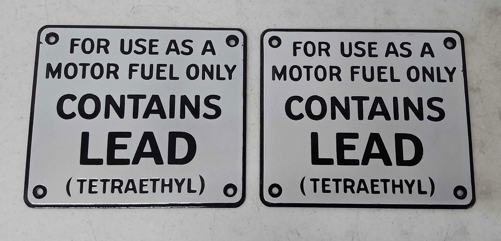 (2) NOS porcelain "Contains Lead" signs (1 of 2)