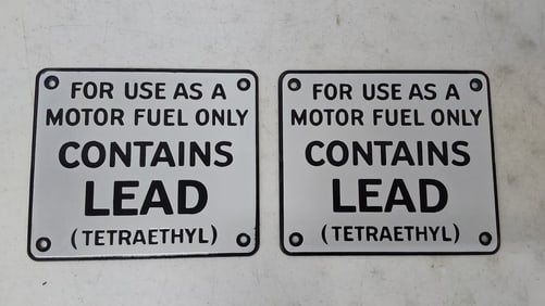 (2) NOS porcelain "Contains Lead" signs