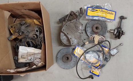 box of Whizzer motorized bike parts