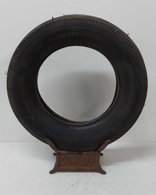 cast iron Dunlop tire stand with Dunlop tire