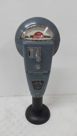 one cent parking meter with keys