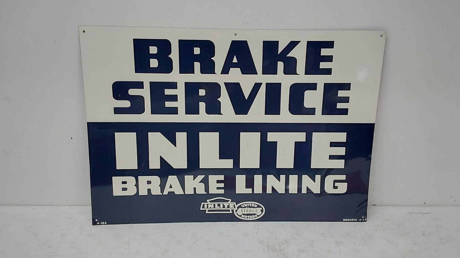 1949 Brake Service Inlite Brake Lining SST sign (1 of 2)