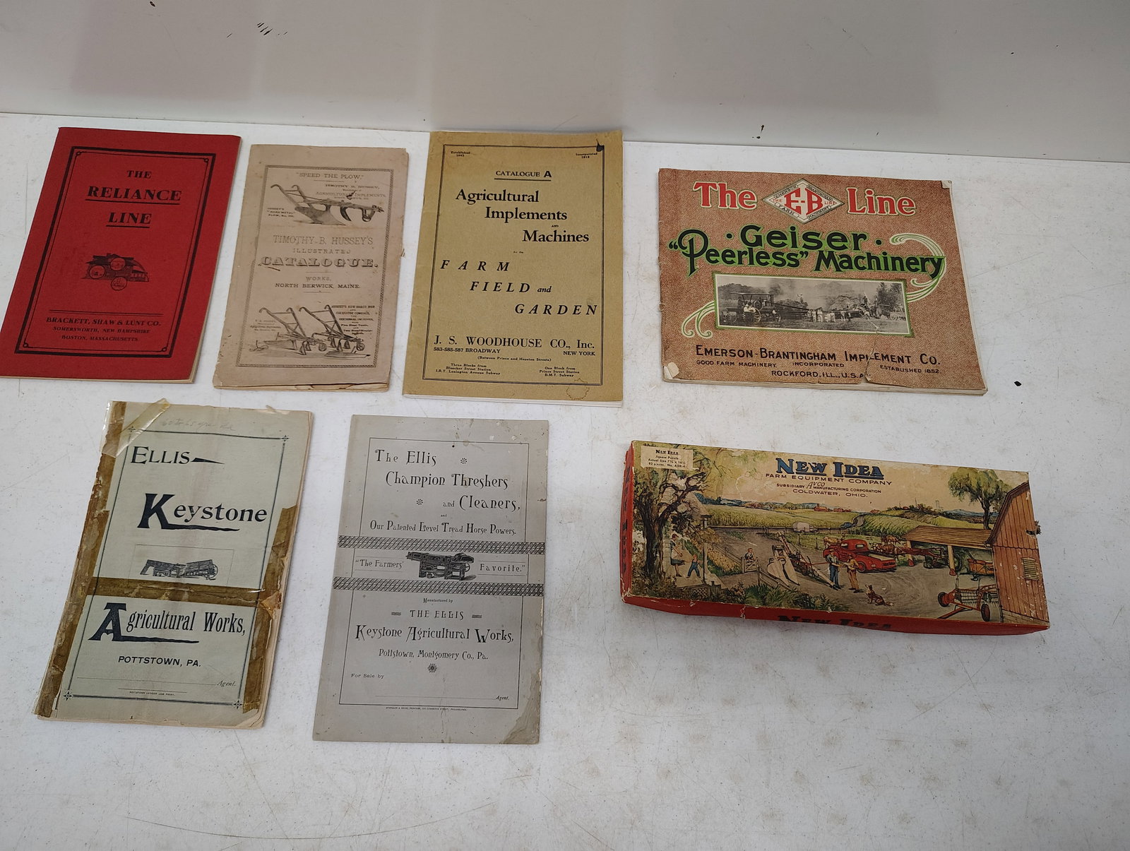 catalogs: farm equipment and a "New Idea" puzzle not sure if it complete