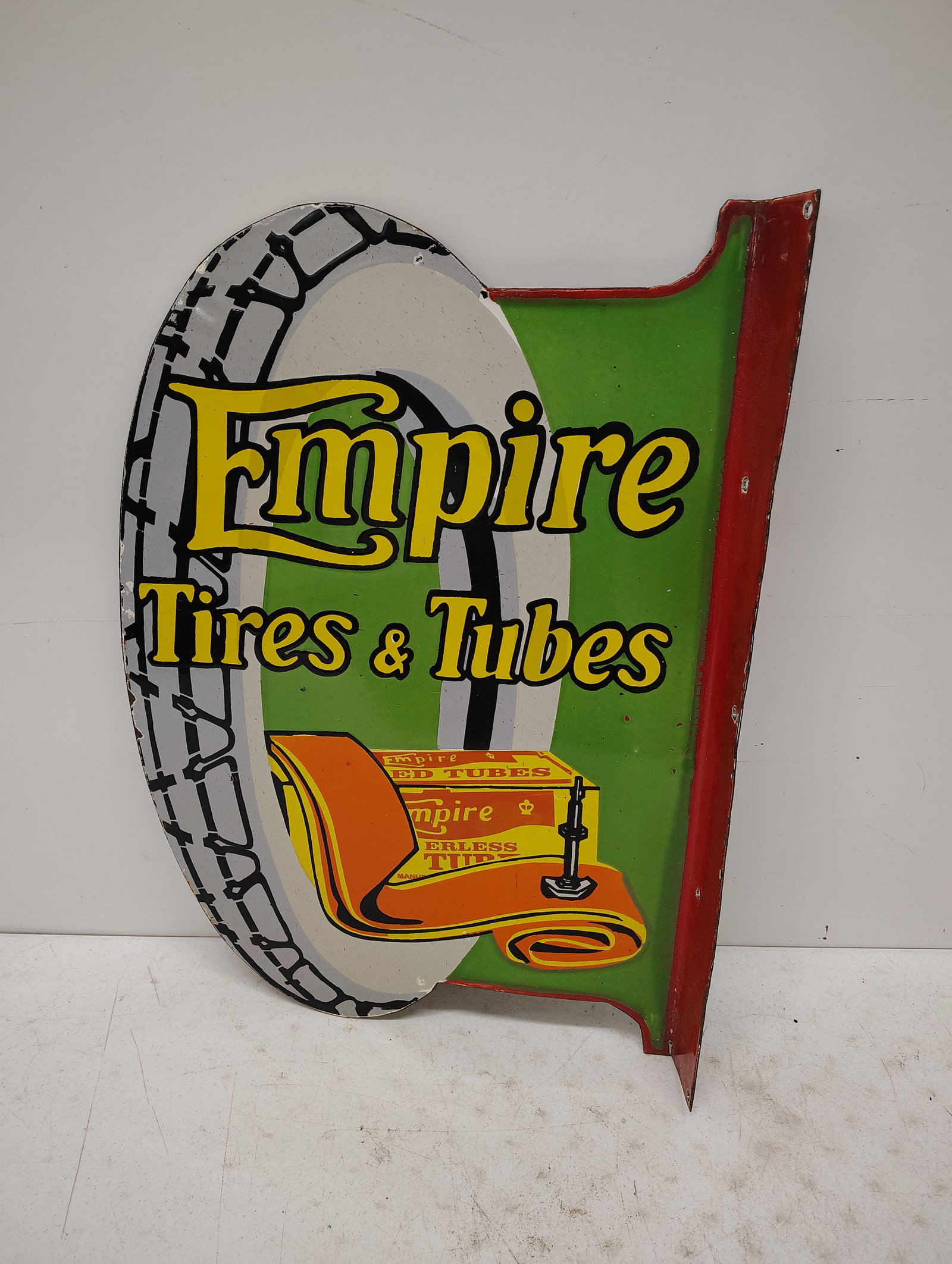 reproduction sign: Empire Tires and Tubes flang sign double sided porcelain 17" x 24"