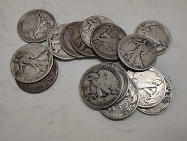 (15) Walking half dollars