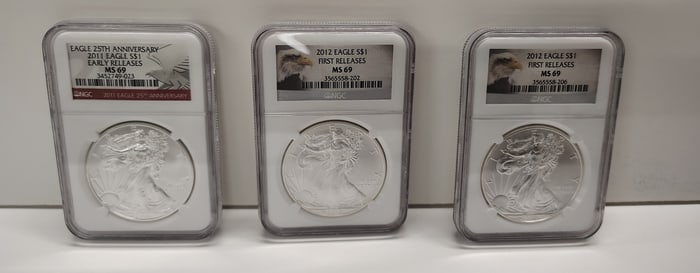 (3) silver graded eagles