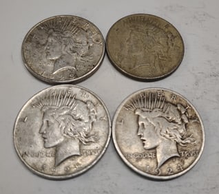 (4) Peace dollars