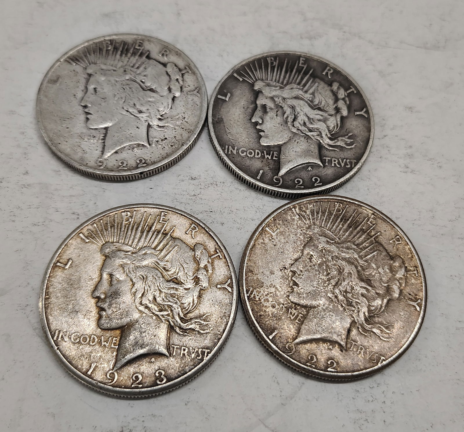(4) Peace dollars (1 of 2)