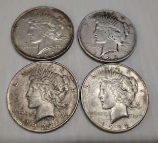 (4) Peace dollars