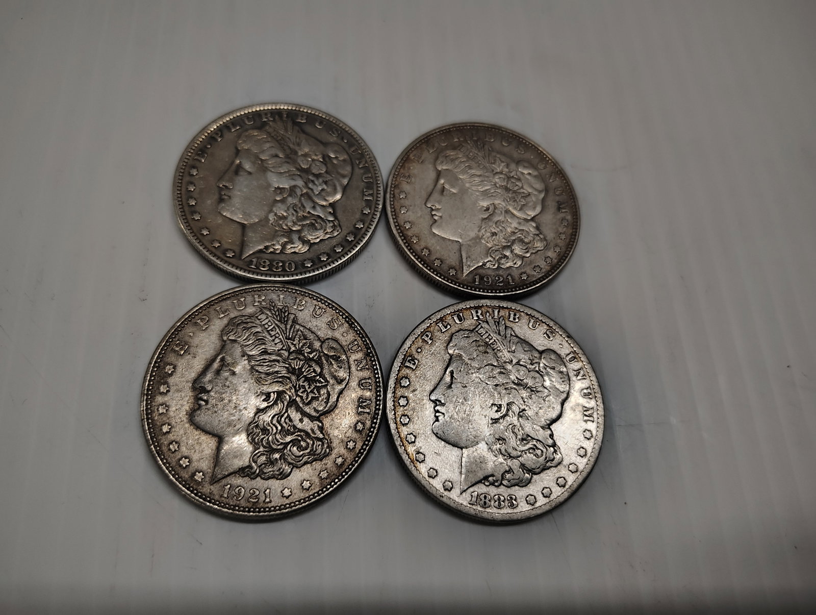(4) Morgans: 1921-D 1800-S 1921 1883