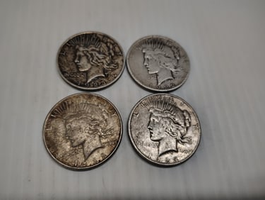 (4) peace dollars