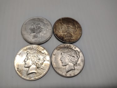(4) peace dollars