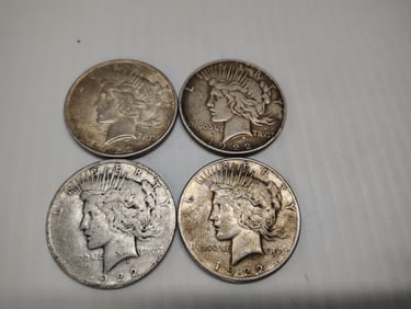 (4) peace dollars