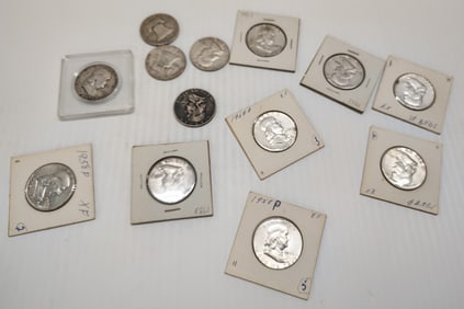 (13) Franklin half dollars