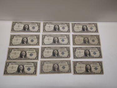 (2) 1957 consecutive serial numbers and (10) ones