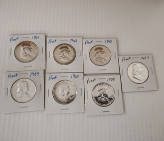 (7) Franklin half dollars