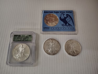 (4) silver eagles one is graded