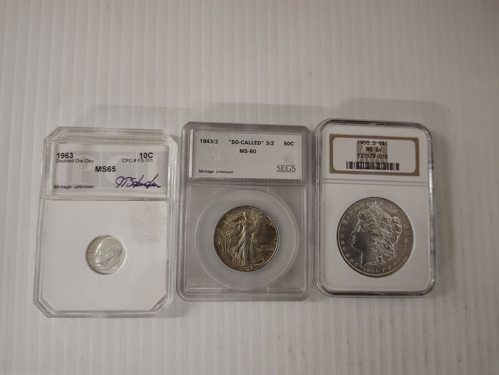 (3) graded coins morgan walking half dollar (1 of 1)